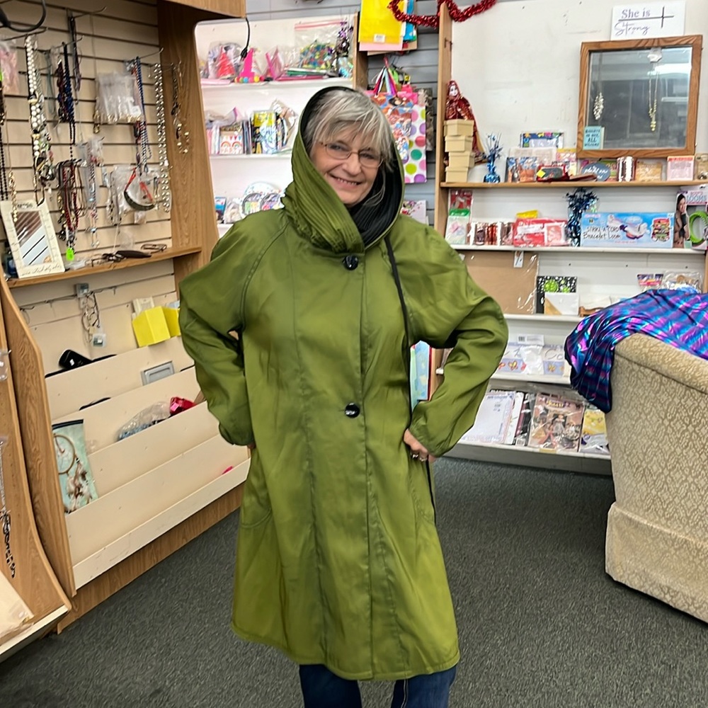 669. Green Jacket, reversible to black with handbag.